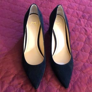 Slightly used Marc Fisher suede heels. Light scuffing on back of heels.